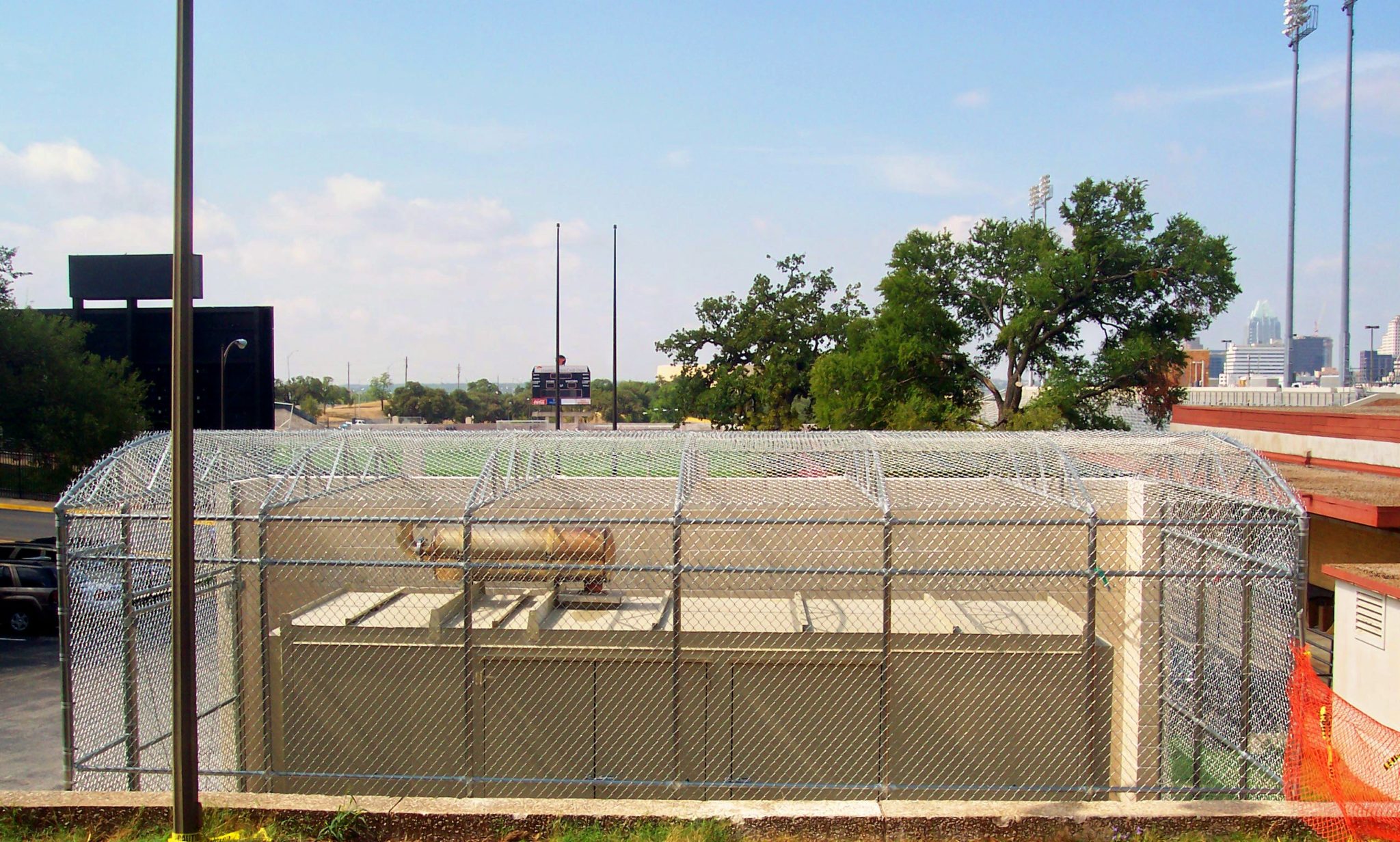 Chain Link Enclosure with Brick Wall - Viking Fence