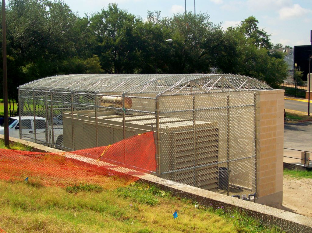 Chain Link Enclosure with Brick Wall - Viking Fence