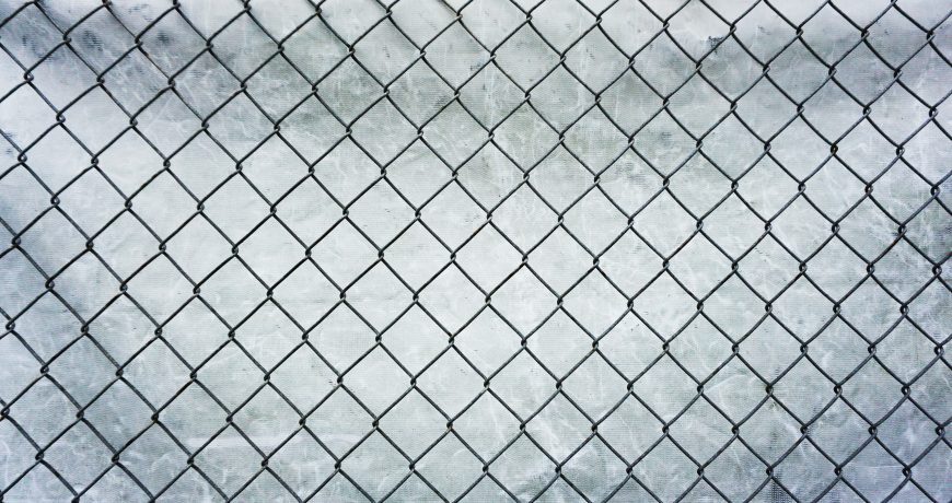 How to install chain link fence on eneven ground - bias cut